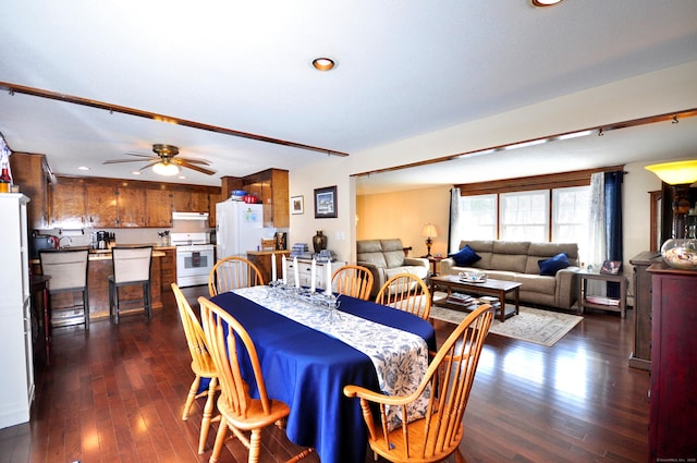 dining space with ceiling fan, dark wood-type flooring, and recessed lighting