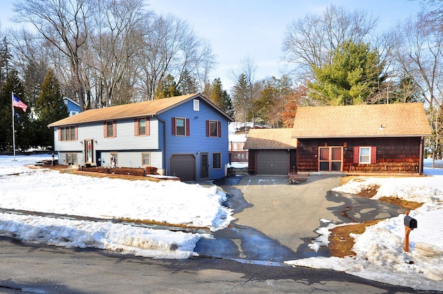 raised ranch featuring driveway