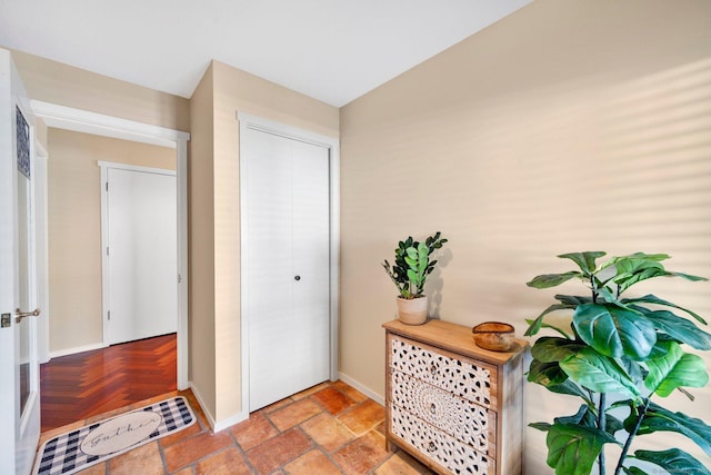 entrance foyer featuring baseboards