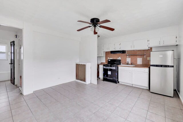 367DBUILDING5 Granfield Ave, Bridgeport, CT 06610 - kitchen featuring freestanding refrigerator, gas stove, ceiling fan, a sink, and ventilation hood