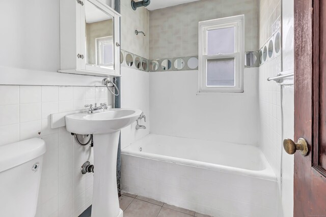 367DBUILDING5 Granfield Ave, Bridgeport, CT 06610 - bathroom with tile walls, bathtub / shower combination, tile patterned flooring, and toilet