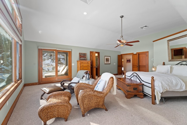 bedroom featuring lofted ceiling, ceiling fan, carpet floors, visible vents, and baseboards