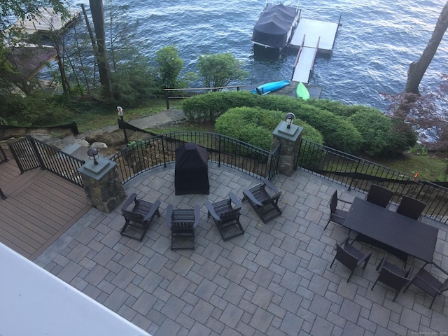 view of patio with a boat dock