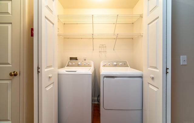 clothes washing area with laundry area and washing machine and dryer