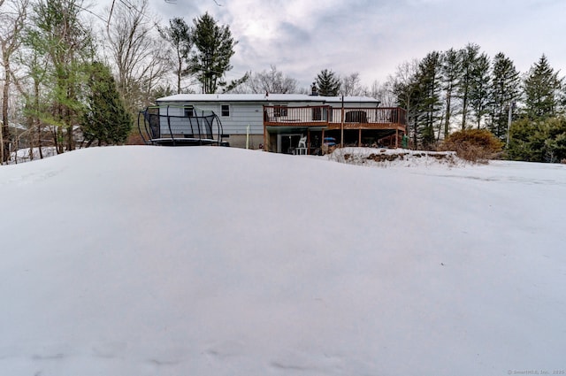 view of front facade with a wooden deck