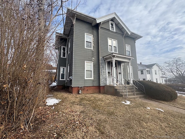 view of front of house featuring crawl space