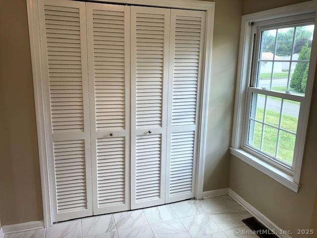 room details featuring visible vents and baseboards