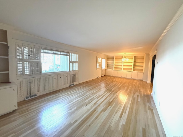 unfurnished living room with light wood-type flooring, visible vents, crown molding, and a notable chandelier