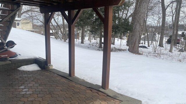 view of snow covered patio