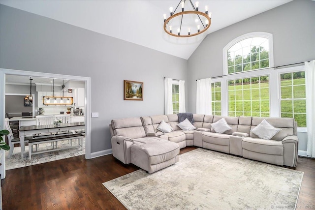 55 Country Woods Ln, Southbury, CT 06488 - living room featuring dark wood-type flooring, a notable chandelier, high vaulted ceiling, and baseboards