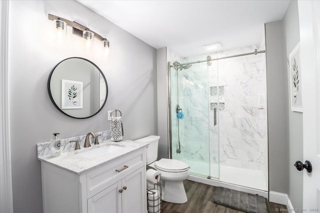 55 Country Woods Ln, Southbury, CT 06488 - full bath featuring toilet, a marble finish shower, wood finished floors, and vanity