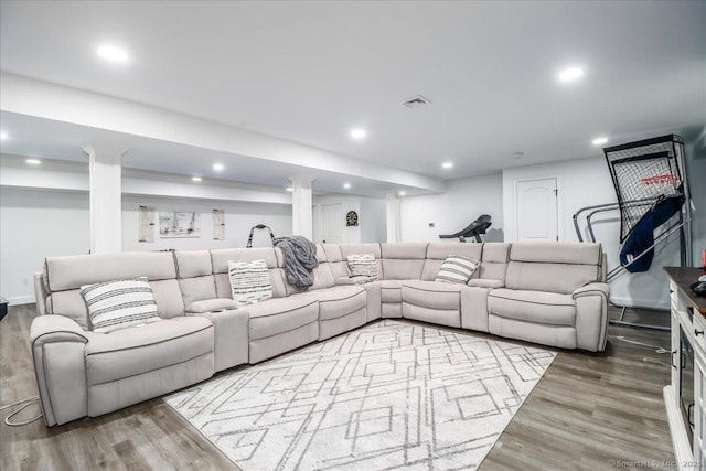 55 Country Woods Ln, Southbury, CT 06488 - living area featuring ornate columns, visible vents, wood finished floors, and recessed lighting