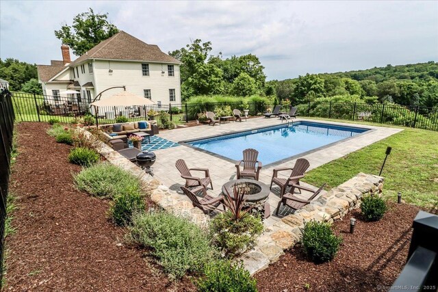 55 Country Woods Ln, Southbury, CT 06488 - view of pool featuring a patio area, fence, and a fenced in pool