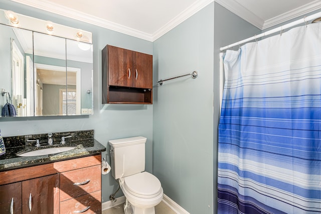 bathroom featuring toilet, baseboards, crown molding, and vanity