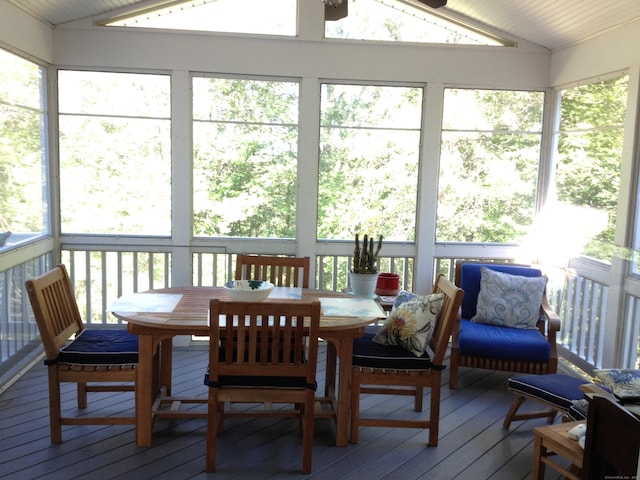 sunroom / solarium with lofted ceiling