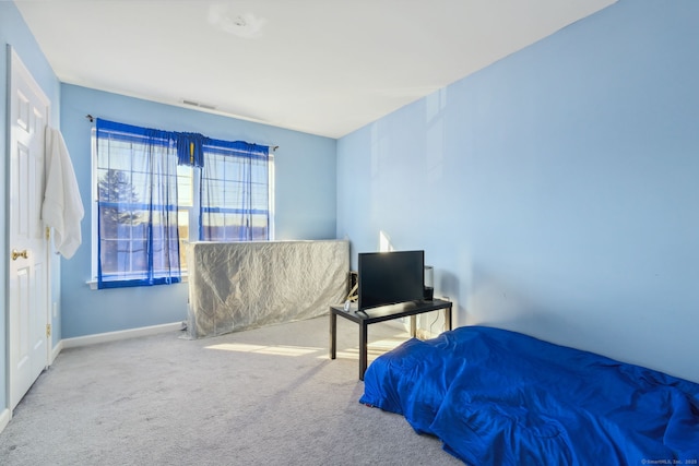 bedroom featuring visible vents, baseboards, and carpet flooring