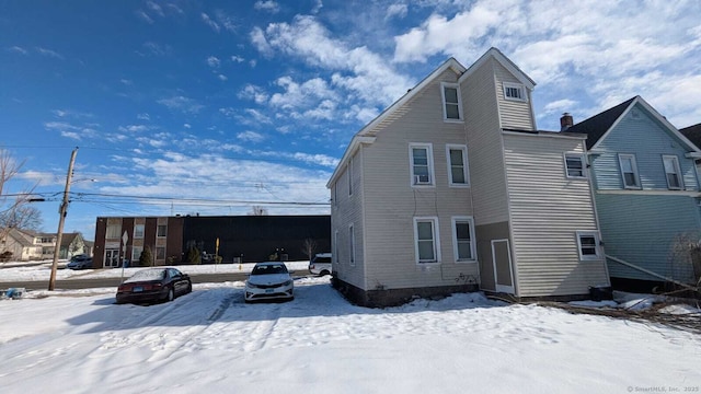 view of snow covered house