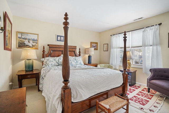 bedroom featuring carpet, visible vents, and baseboards