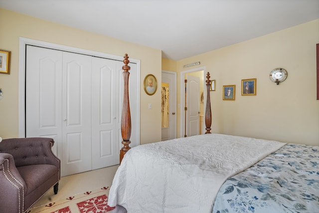 bedroom with carpet and a closet