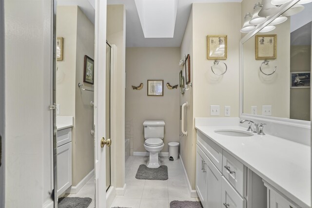 bathroom with toilet, a shower with door, tile patterned flooring, and vanity