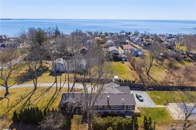 bird's eye view with a residential view and a water view