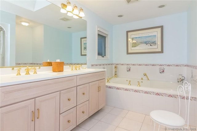 full bath featuring double vanity, visible vents, a garden tub, tile patterned flooring, and a sink