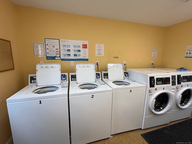 shared laundry area featuring separate washer and dryer