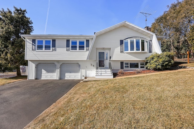 107 Emerson Dr, Stratford, CT 06614 - raised ranch with driveway and an attached garage