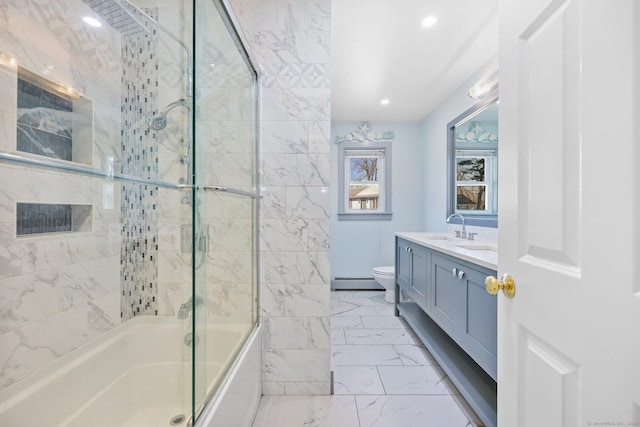 full bathroom with toilet, a baseboard heating unit, shower / bath combination with glass door, vanity, and marble finish floor