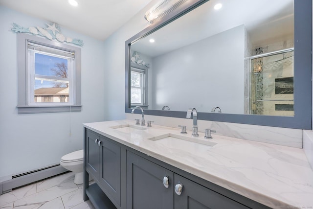 bathroom with a baseboard radiator, toilet, a sink, double vanity, and a stall shower