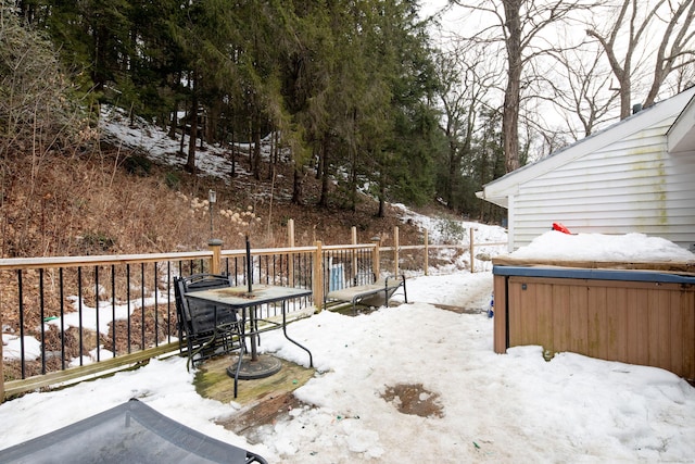 view of snow covered deck