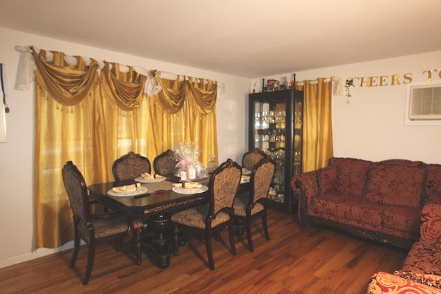 dining space featuring dark wood-type flooring