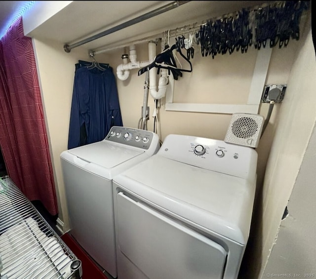 clothes washing area with laundry area and washing machine and dryer