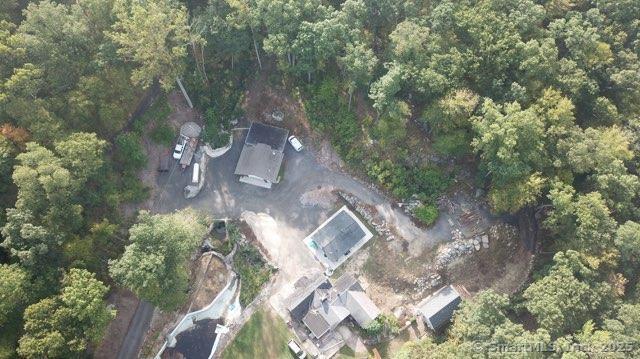 aerial view featuring a forest view