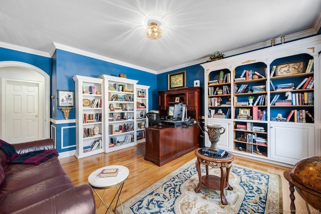 office area featuring crown molding and wood finished floors