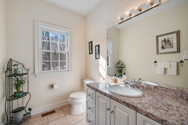 bathroom with visible vents, baseboards, toilet, tile patterned flooring, and vanity