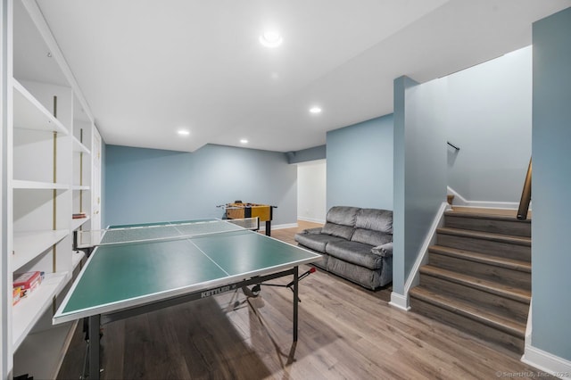 playroom featuring baseboards, light wood finished floors, and recessed lighting