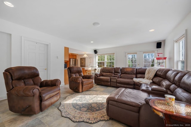 living area with plenty of natural light and recessed lighting