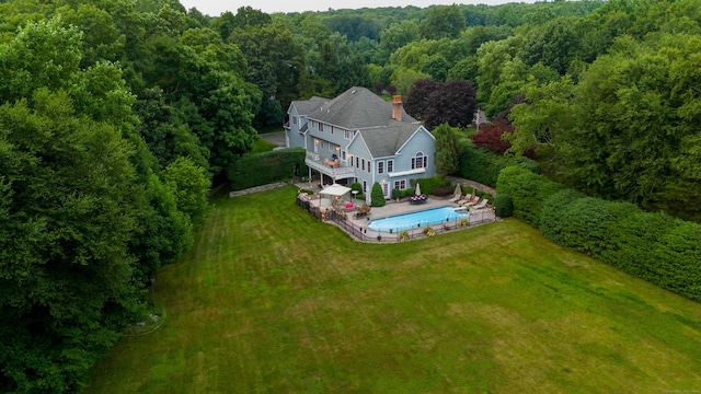 bird's eye view featuring a view of trees