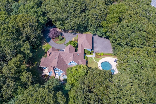 aerial view featuring a view of trees