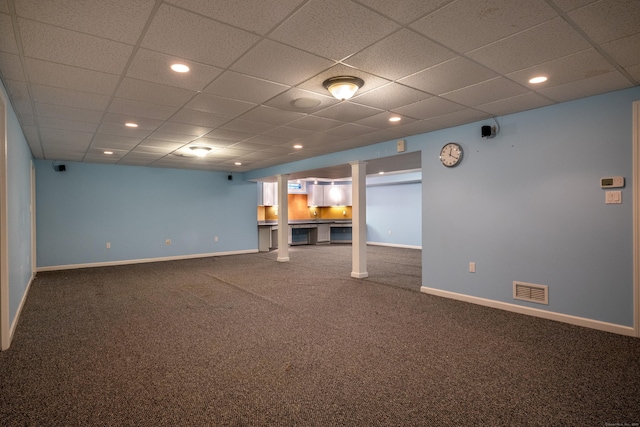 finished below grade area featuring carpet, visible vents, baseboards, and recessed lighting