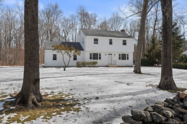 view of front of home with a chimney