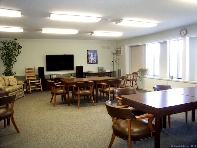 view of carpeted dining area