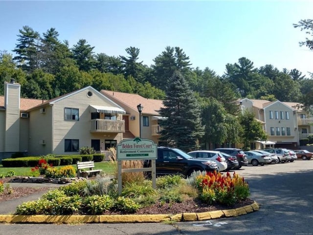 exterior space featuring uncovered parking