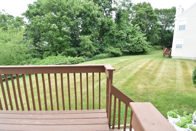 deck featuring a yard