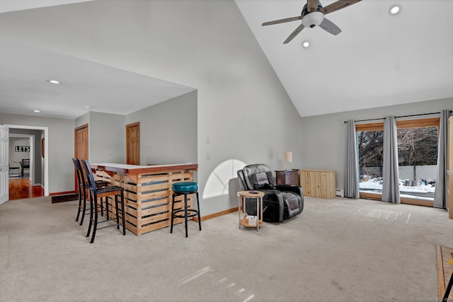 sitting room featuring baseboards, a ceiling fan, carpet floors, high vaulted ceiling, and recessed lighting