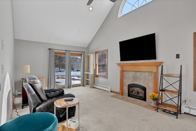 living room featuring high vaulted ceiling, a fireplace, a baseboard heating unit, and carpet flooring