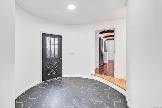 foyer with baseboards