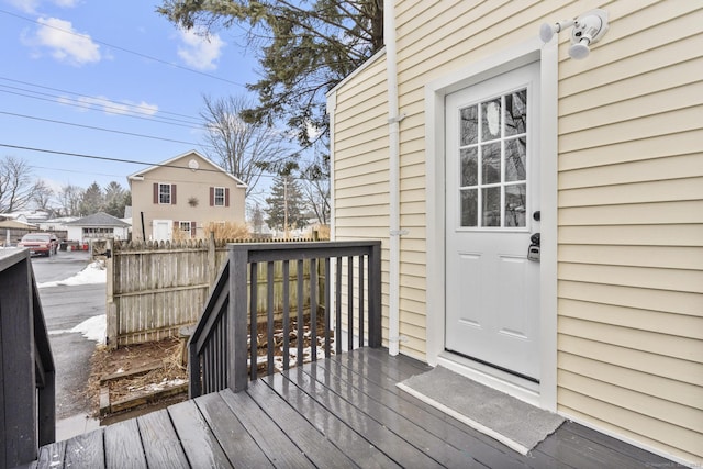 wooden deck featuring fence