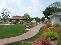 view of community featuring a yard and a gazebo